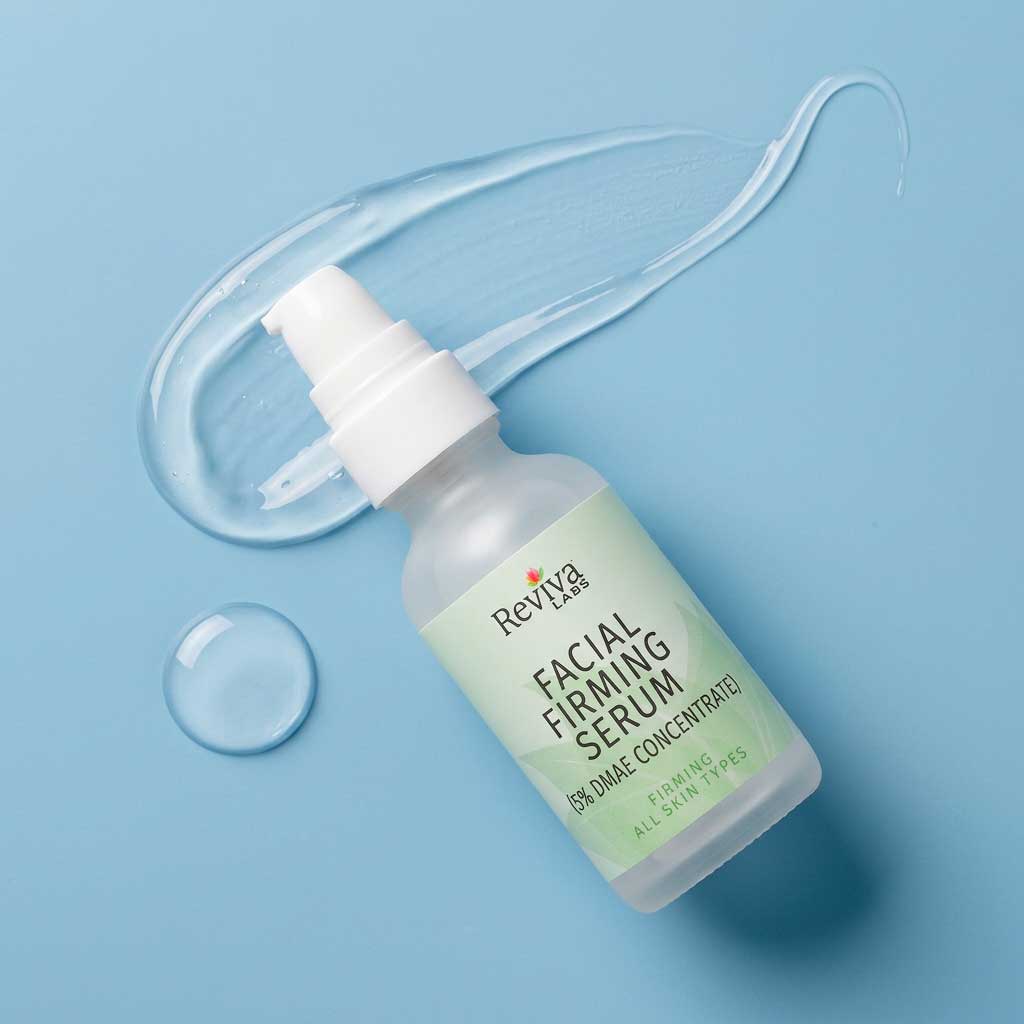 Facial serum bottle on light blue background