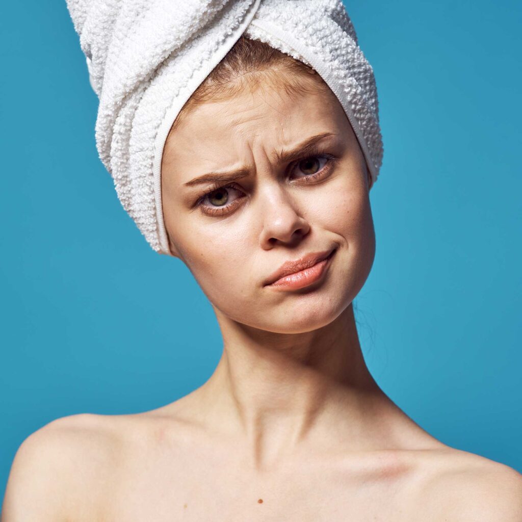 woman with bare shoulders with towel on head massa 2025 03 11 17 51 24 utc
