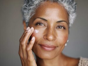 attractive middle aged ethnic female using an eye 71328d8f da87 4590 9982 2aced9e89c6b 3