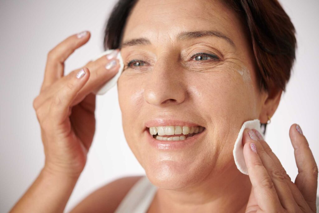 woman wiping off makeup 2025 02 11 13 52 39 utc