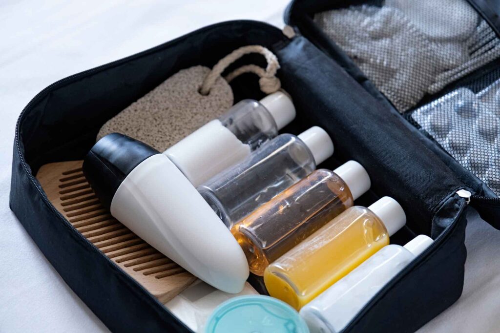 travel cosmetics kit on bed top view 2025 03 14 02 06 09 utc