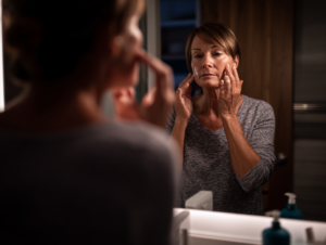 a quiet nighttime bathroom scene woman in her l 17d33c32 7b08 4eab 92d7 71661c9649b0 2