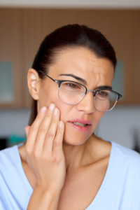 model with hair pulled back shes examining her 3c6dd503 dfdc 4e9c 8957 d89271c5469f 3