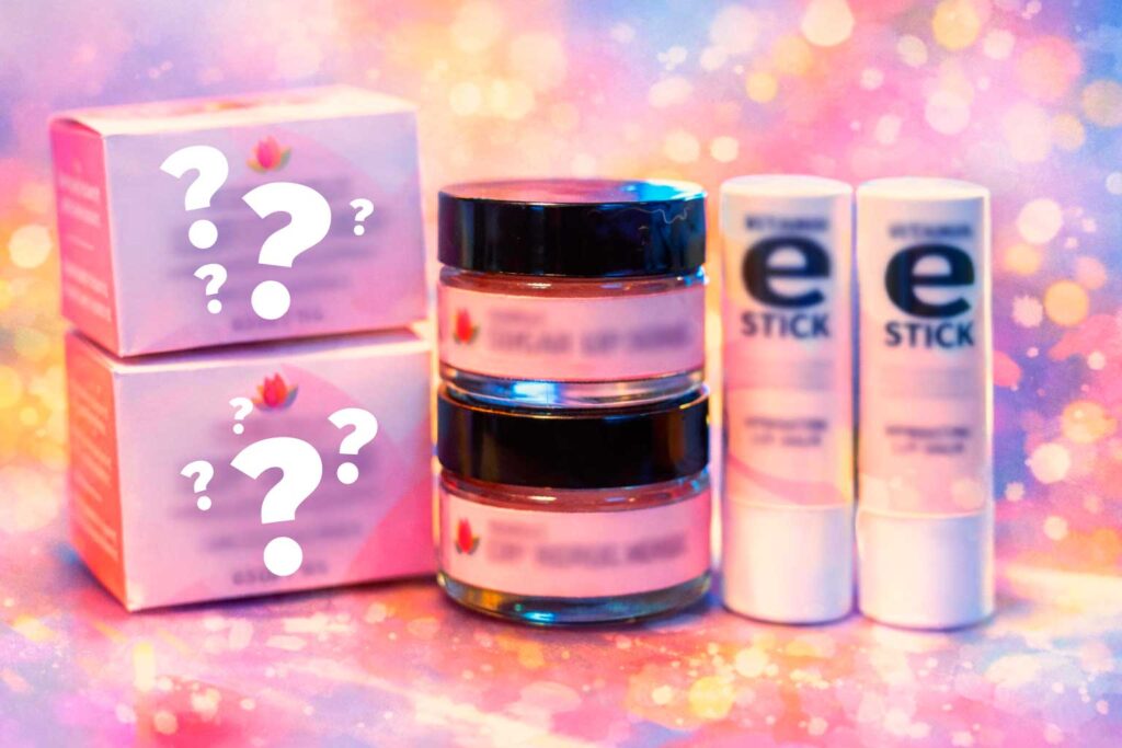 Assorted beauty and skincare products on colorful background.