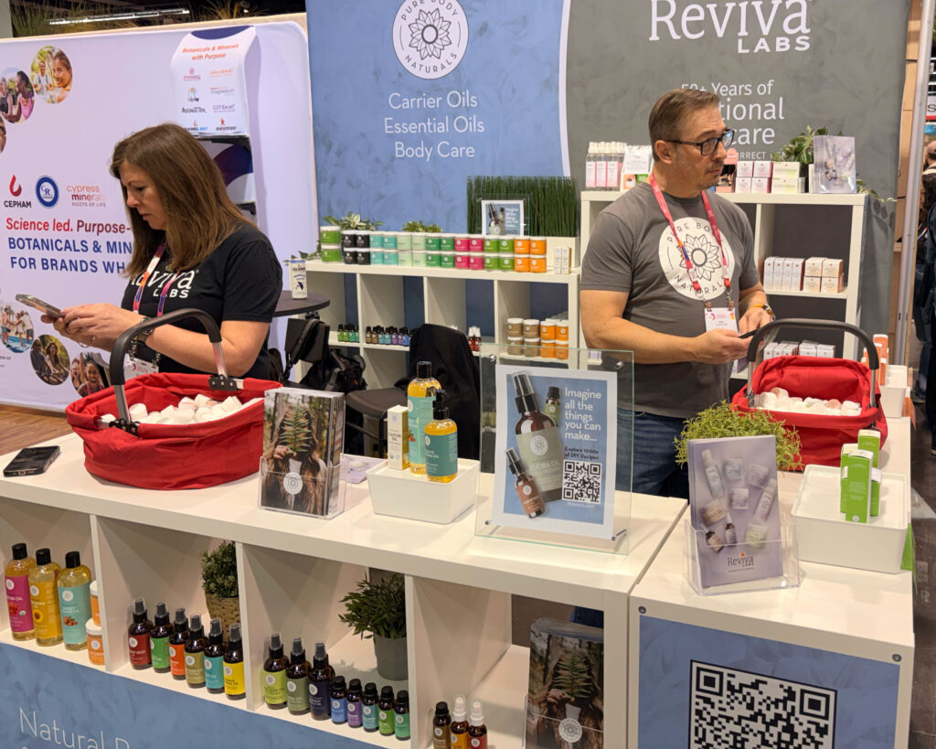 Reviva Labs exhibition booth with products displayed