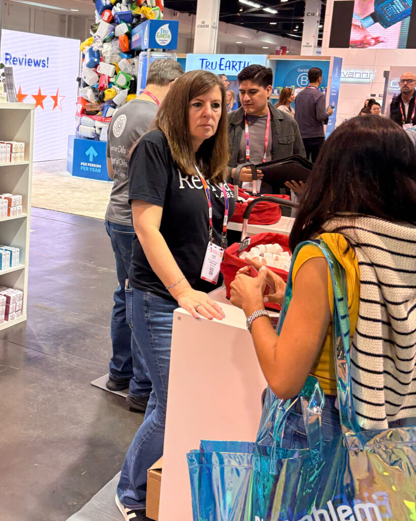 Exhibition booth with people interacting