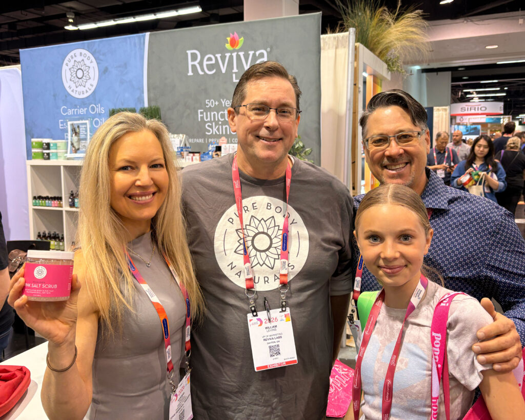 Group at a trade show booth