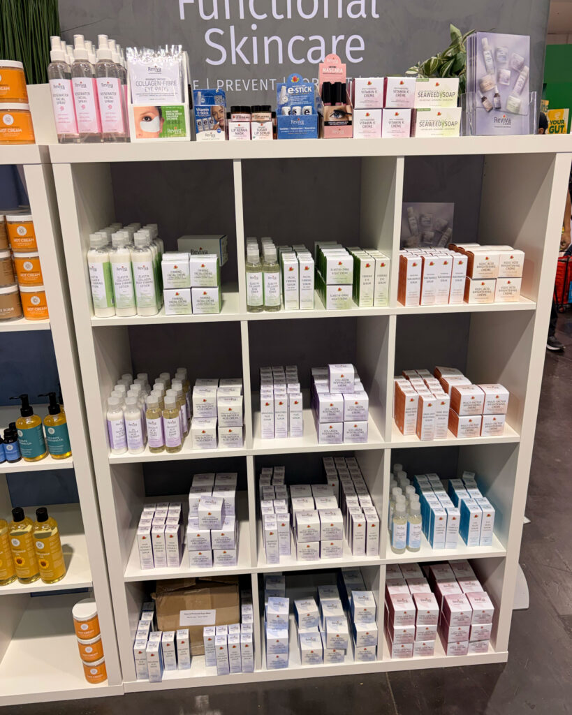 Organized skincare products on a display shelf.