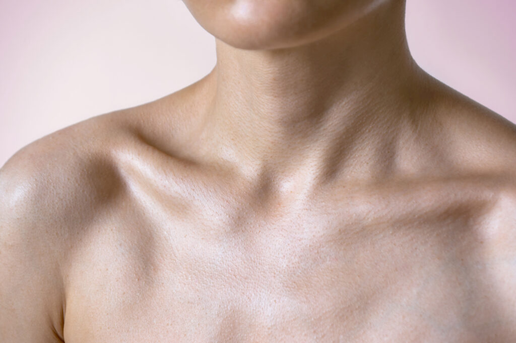 Close-up of a person's collarbone