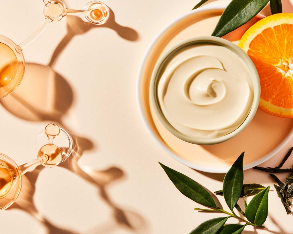Natural skincare cream with orange and botanical oils