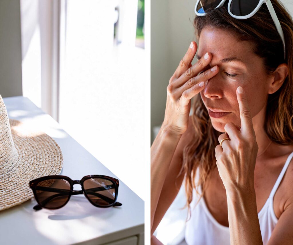 Woman applying cream near window with sunglasses nearby