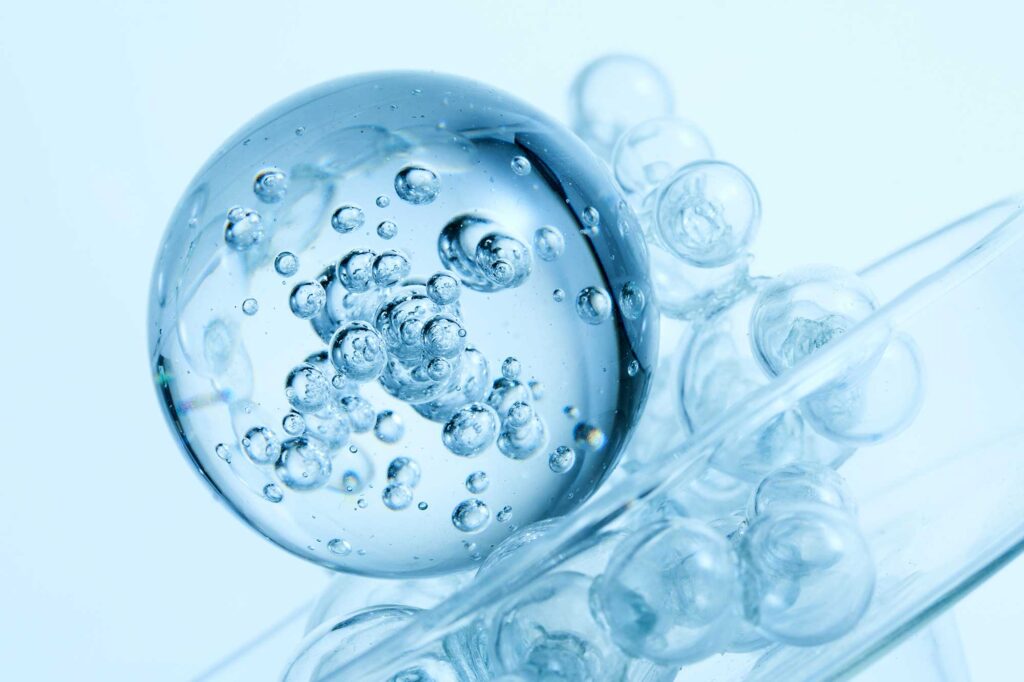 Close-up of glass sphere with trapped air bubbles