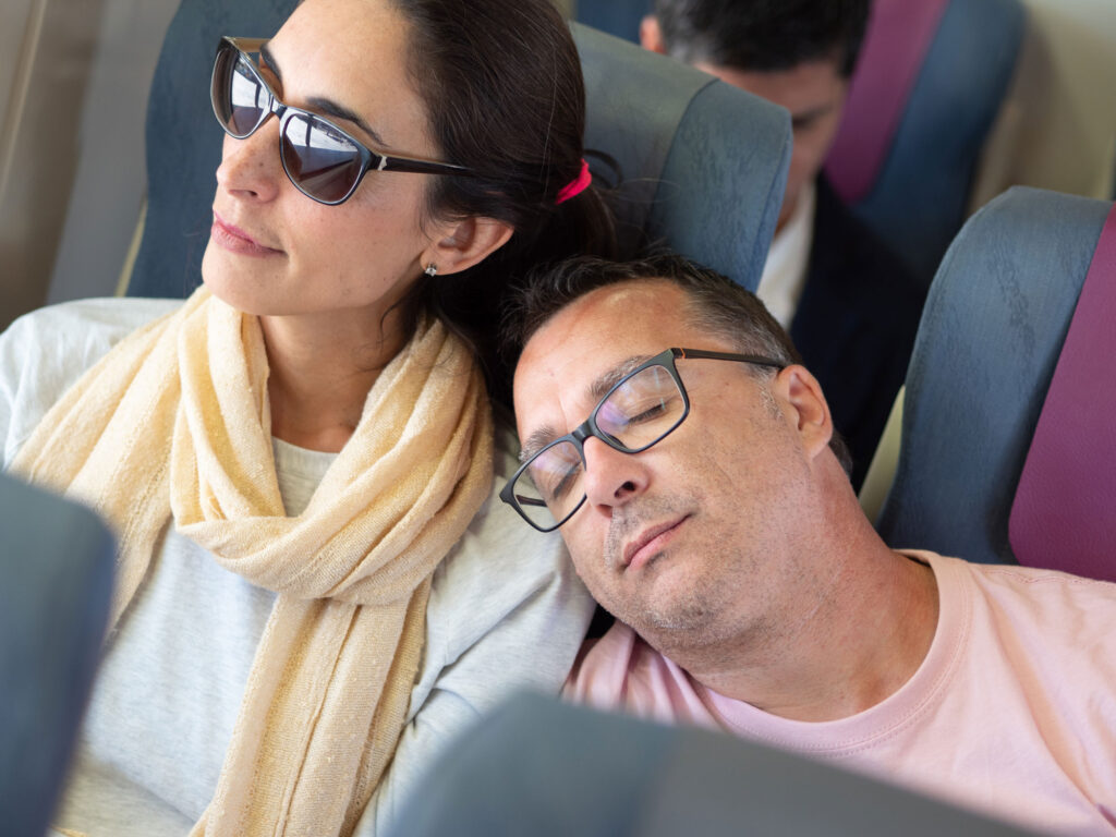 couple relaxing together while traveling on train 2026 03 08 22 59 20 utc