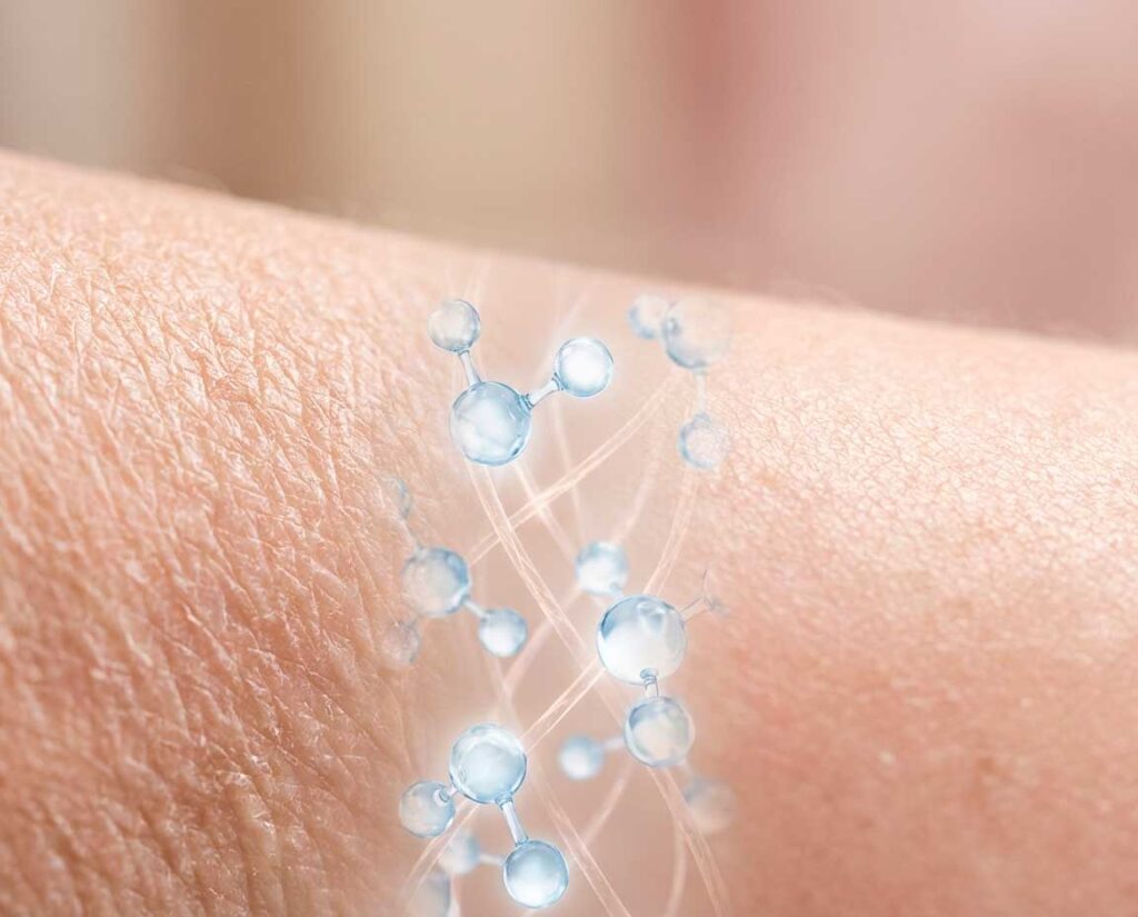 Molecular structures penetrating human skin close-up