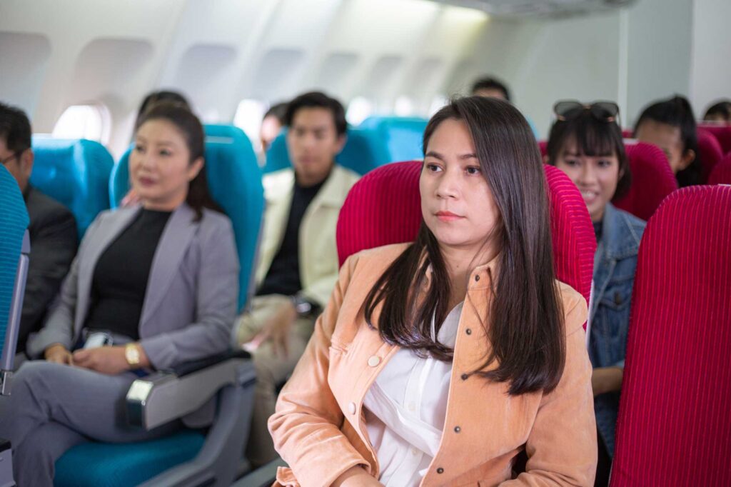 passengers sitting in airplane seats during flight 2026 03 24 05 31 06 utc