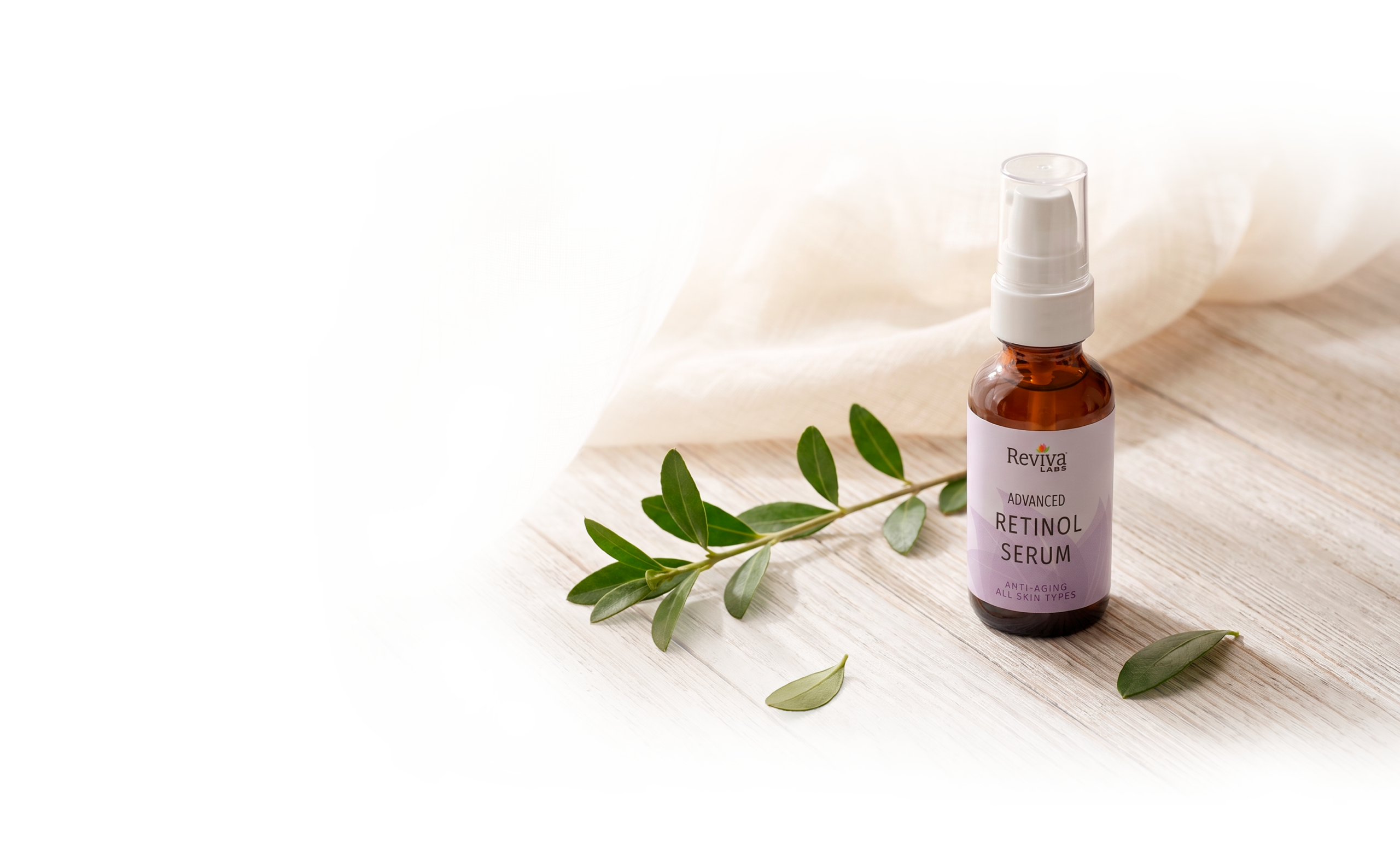 Reviva Labs retinol serum bottle with green leaves