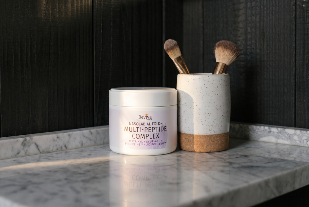 Multi-peptide face cream jar with makeup brushes
