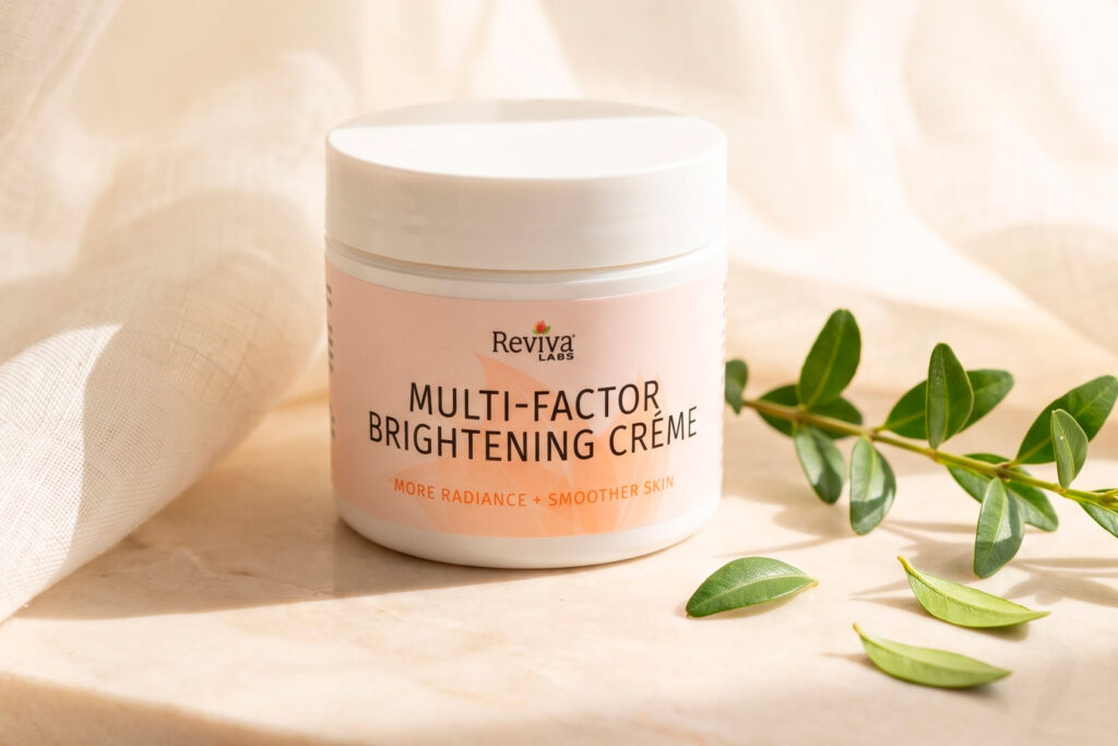 Reviva Labs Multi-Factor Brightening Crème jar with green leaves
