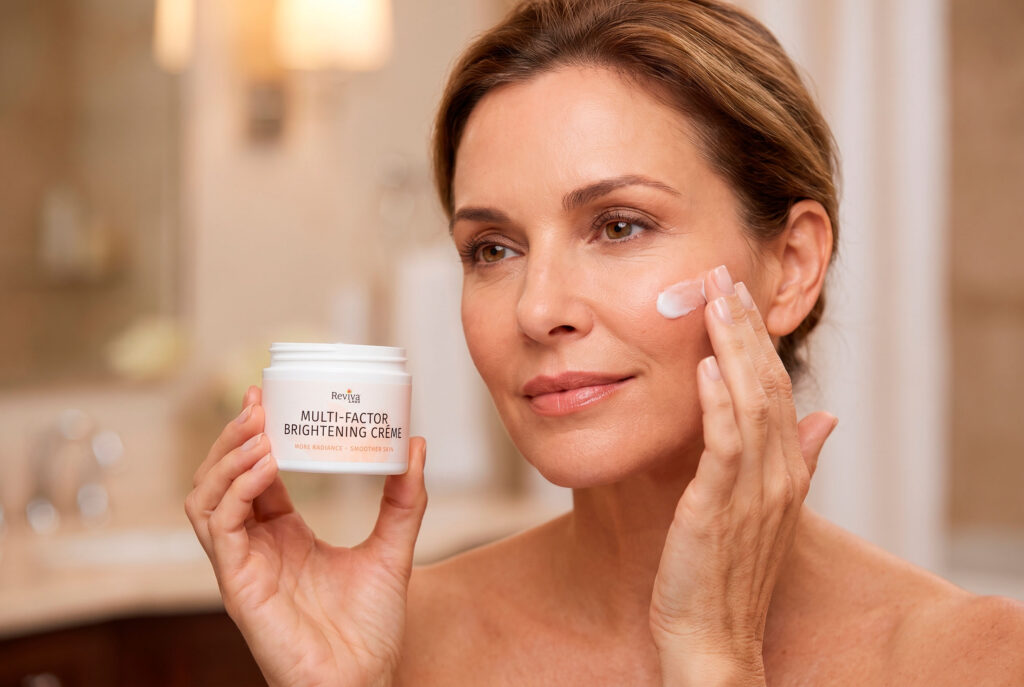 Woman applies Reviva Labs brightening cream to her cheek.