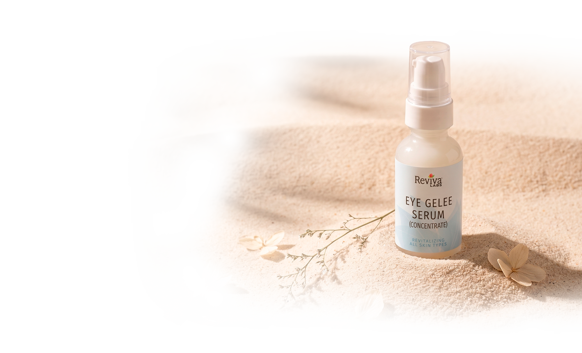 Reviva Labs Eye Gelee Serum bottle on sand